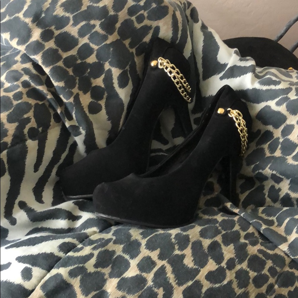 Black and gold stilettos